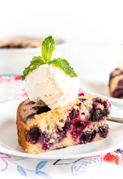 This homemade Blueberry Cake is a simple cake loaded with juicy blueberries, you’ll want to keep this recipe on hand for all your summer gatherings.
