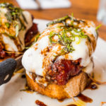 Bruschetta Toast on a white plate.