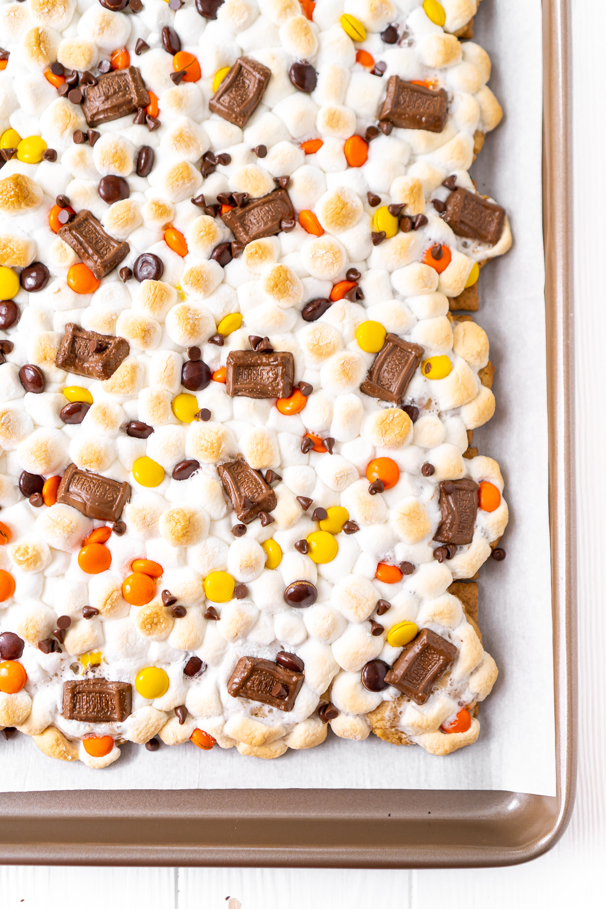 Overhead photo of smores bars on a baking sheet.