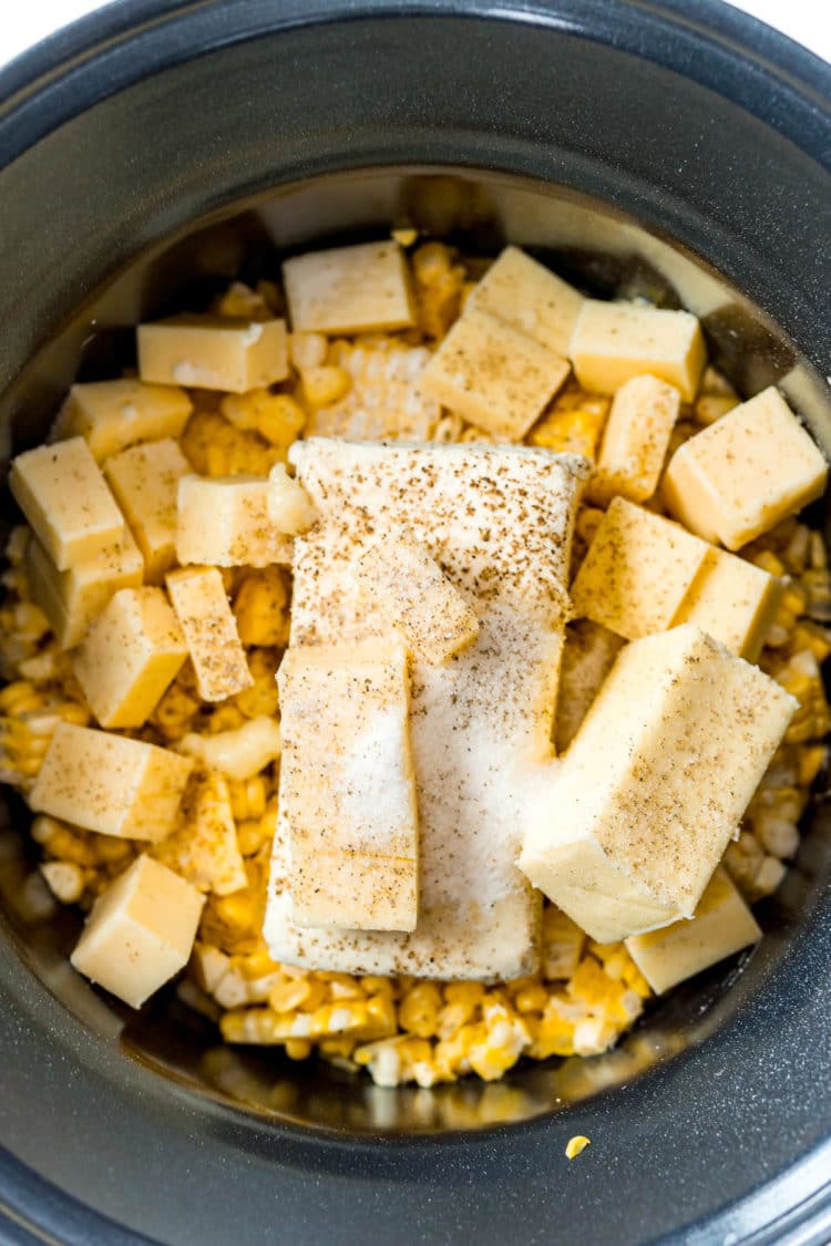 Ingredients for making cheesy corn in a crockpot ready to cook.