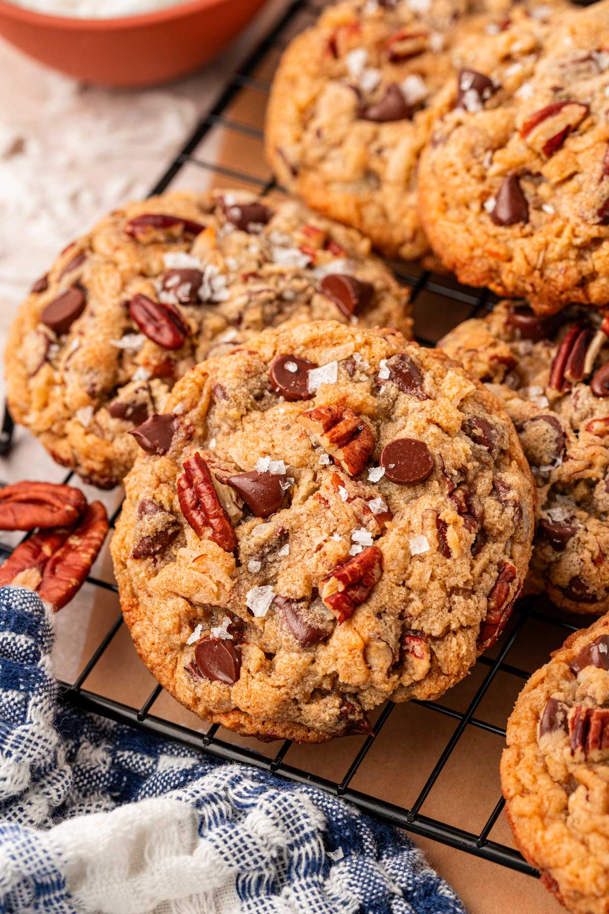 Cowboy Cookies on a wire rack.