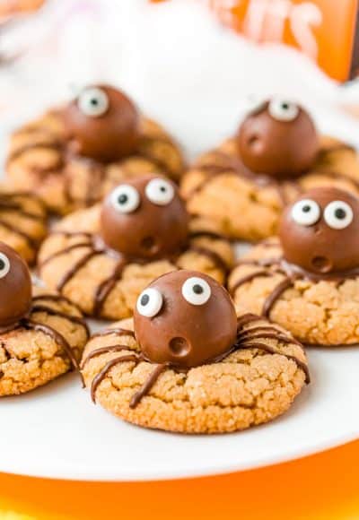 Halloween Spider cookies on a white plate.