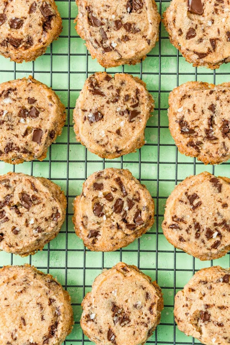 Salted Chocolate Chunk Shortbread Cookies on a wire cooling rack.