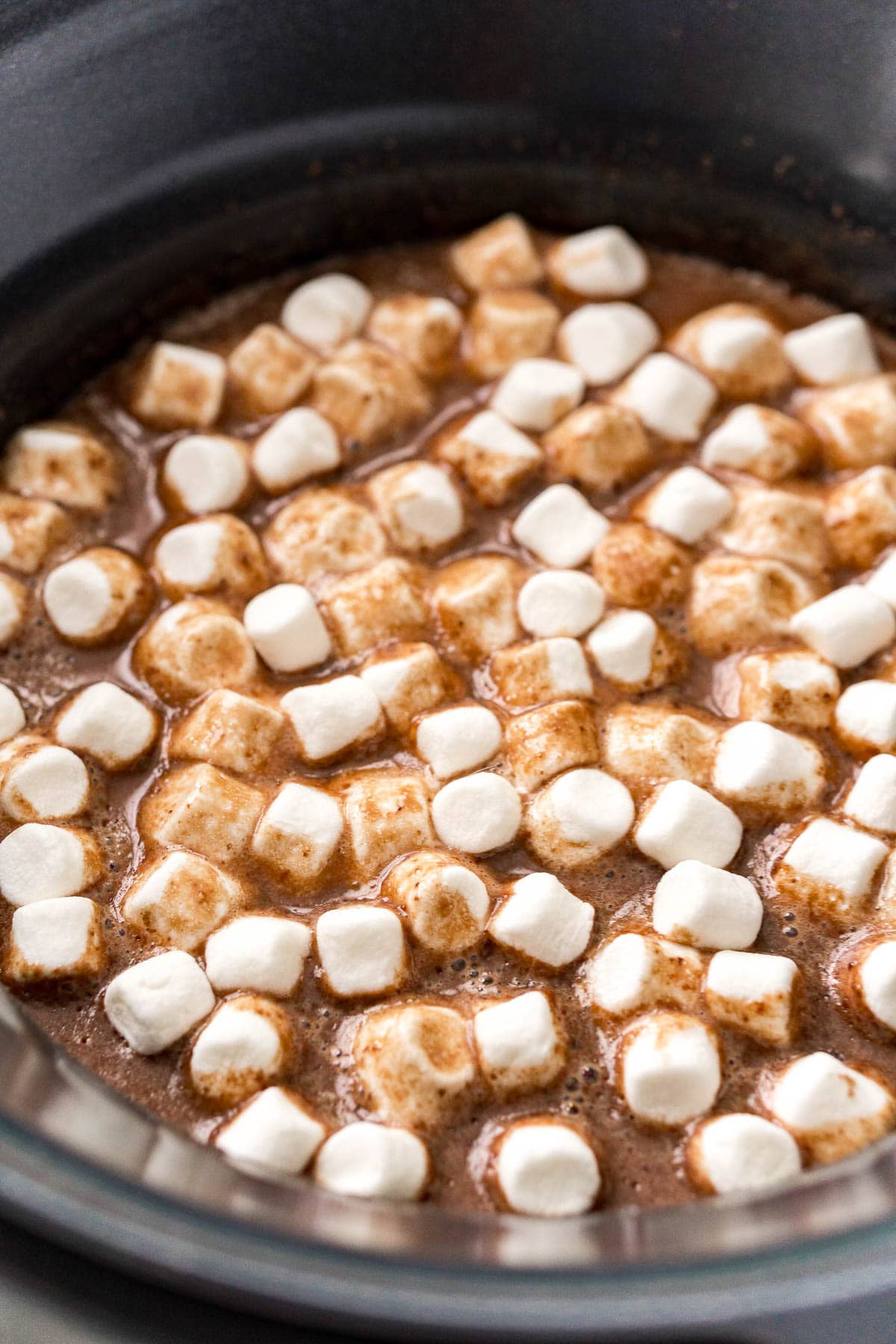 Mini marshmallows and hot chocolate in a crockpot.