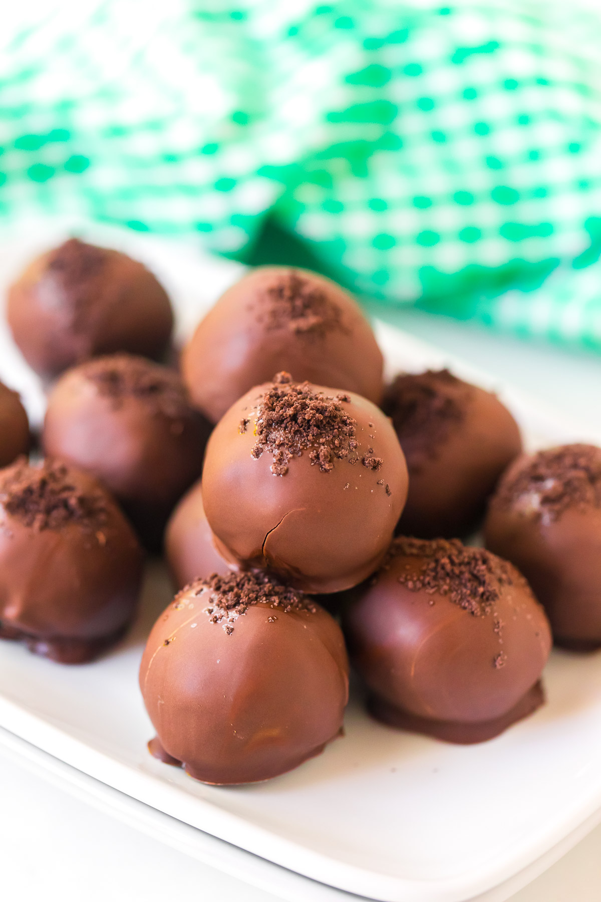 Mint Cookie Truffles on a white plate.