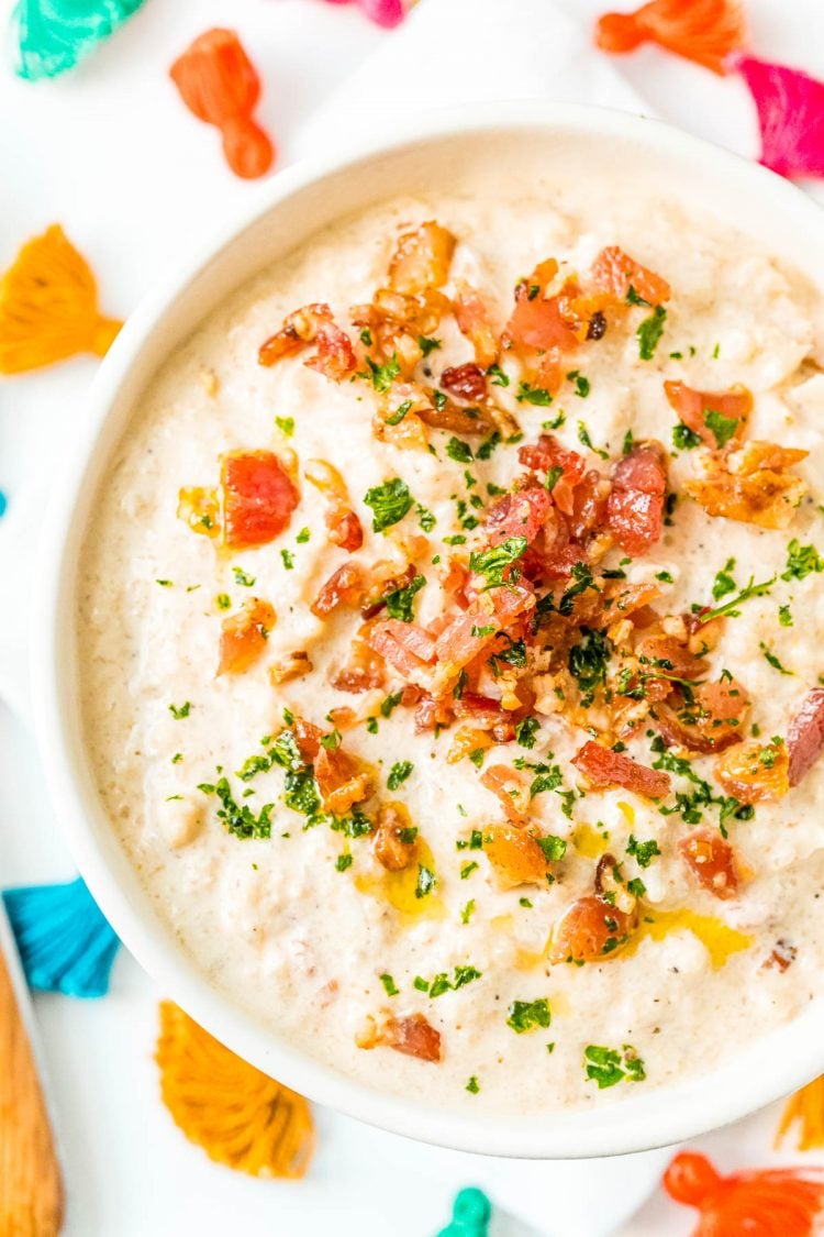 Overhead photo of a bowl of Cauliflower Chowder topped with bacon.