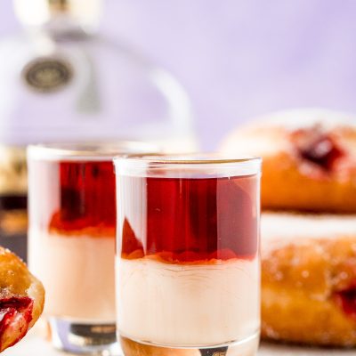 Close up photo of jelly donut shots.