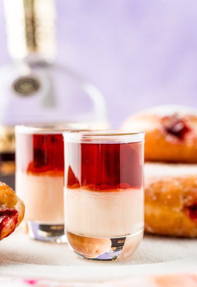 Close up photo of jelly donut shots.