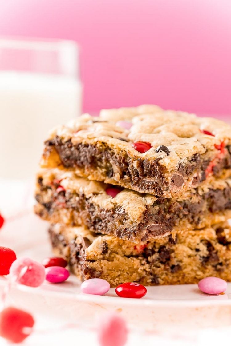 Close up photo of three chocolate chip cookie bars stacked on top of each other.