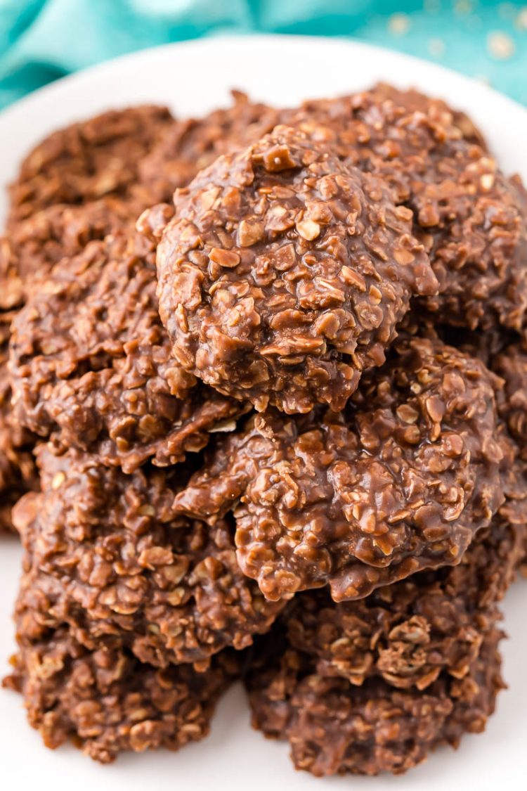 No bake cookies on a white plate on a blue napkin.