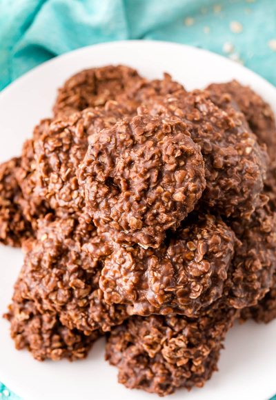 No bake cookies on a white plate on a blue napkin.