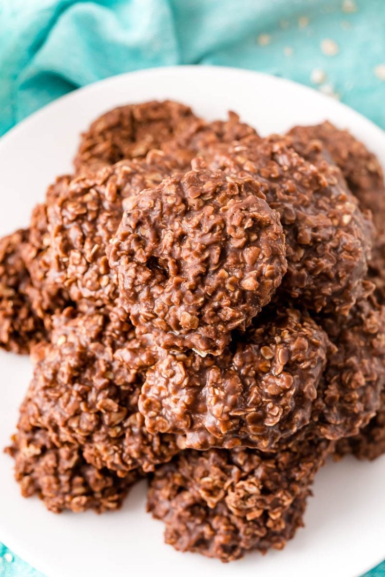 No bake cookies on a white plate on a blue napkin.