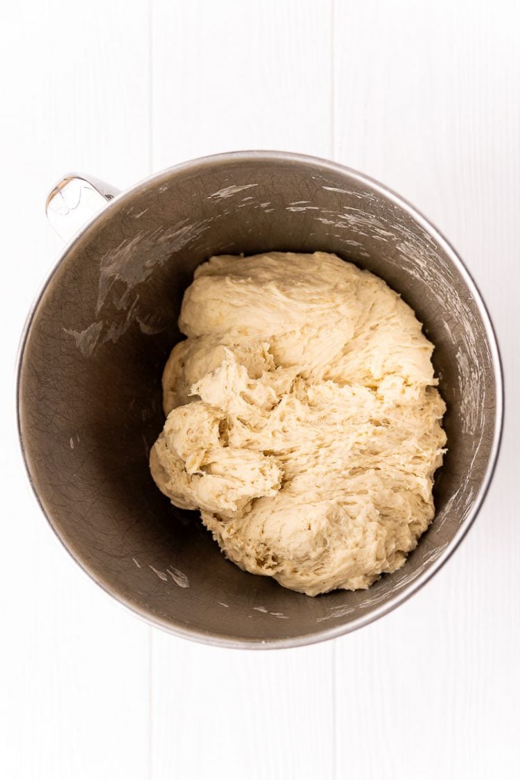 Bread dough in a stand mixer bowl.