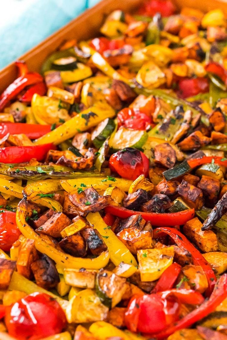 Roasted vegetables on a sheet pan.