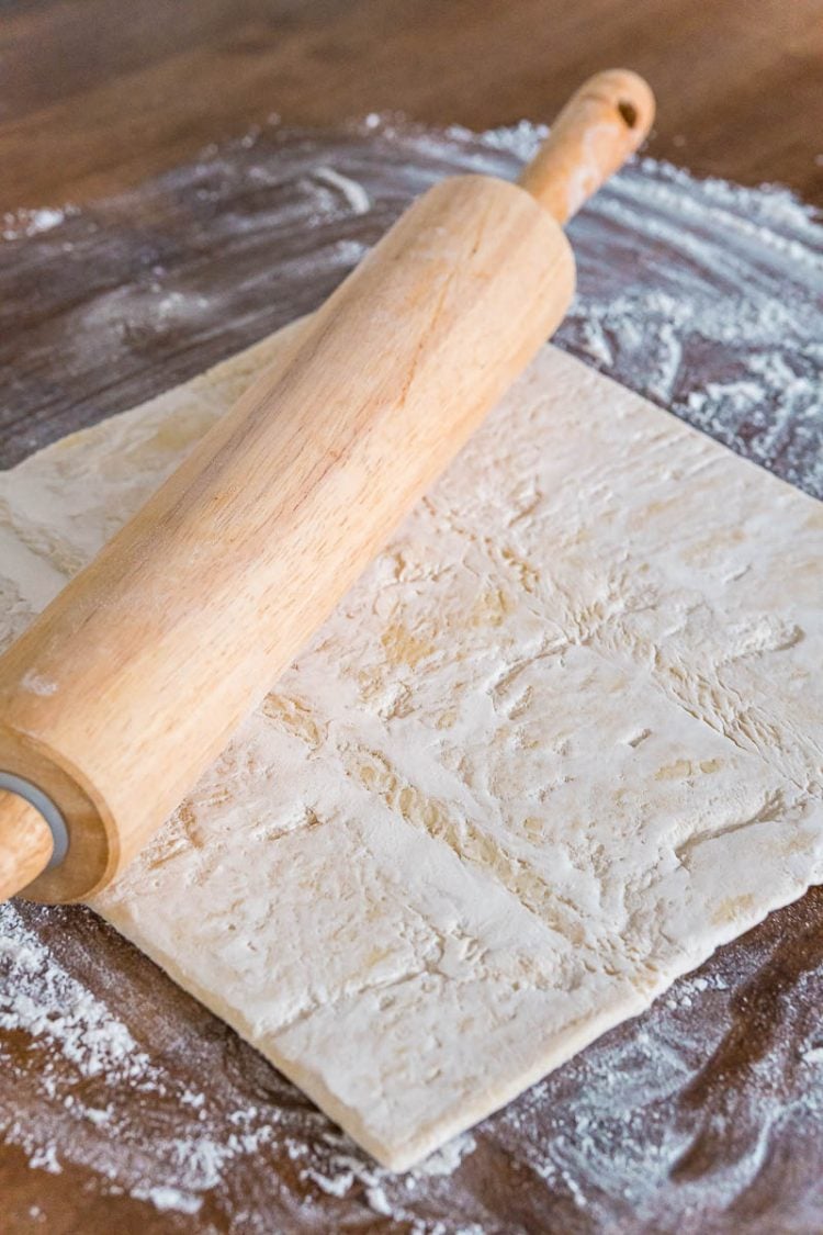Puff pastry dough being rolled out.