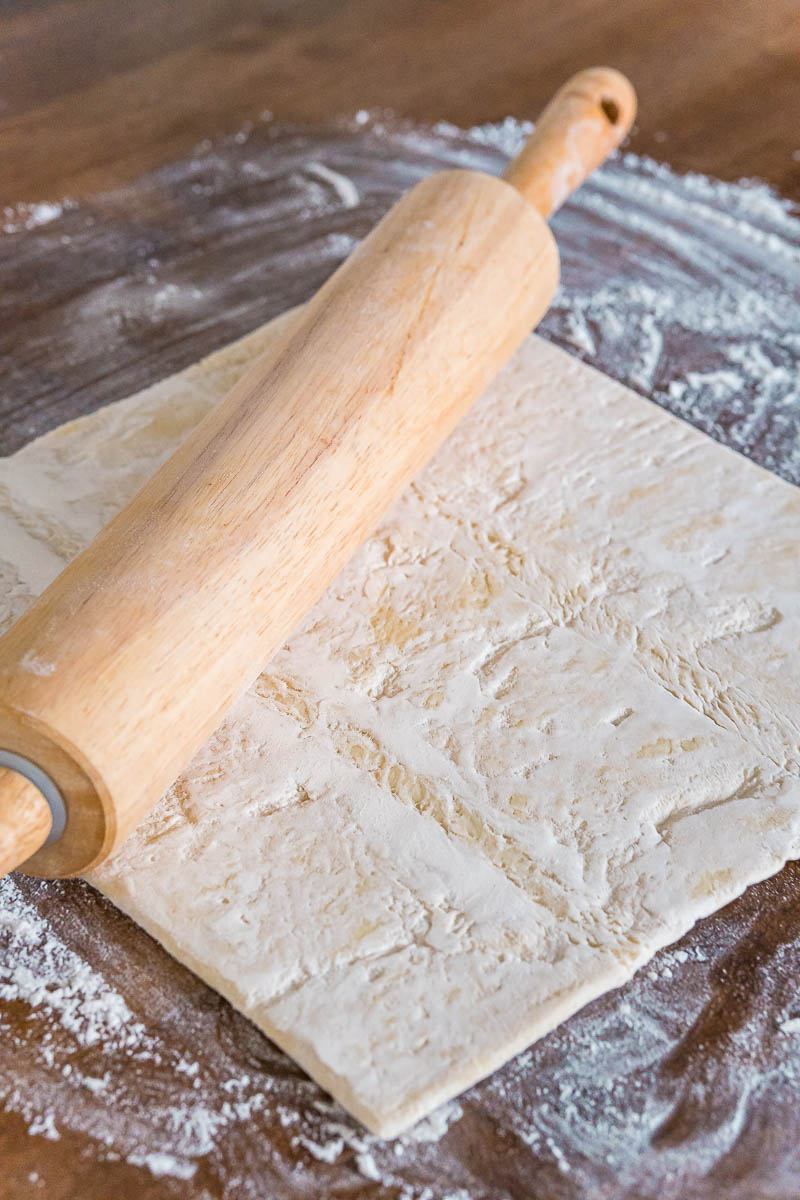 Puff pastry dough being rolled out.