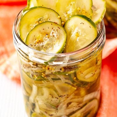 Bread and butter pickles in a mason jar.
