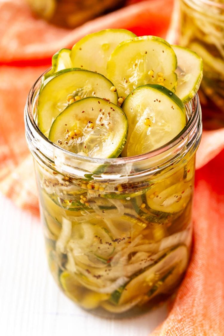 Bread and butter pickles in a mason jar.
