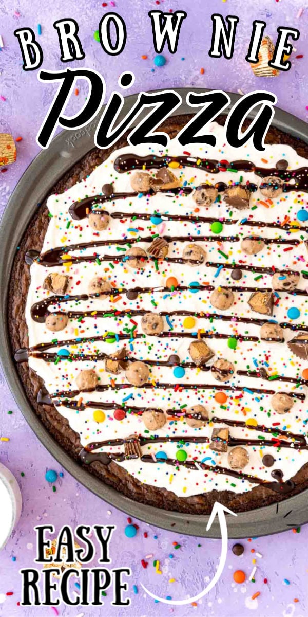 Brownie Dessert Pizza is a fun recipe everyone will enjoy! A “crust” of brownie is topped with a layer of Cream Cheese Whipped Cream, then finished with edible cookie dough, candy, and a drizzle of chocolate syrup! via @sugarandsoulco