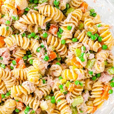 Overhead photo of tune noodle salad in a class bowl.