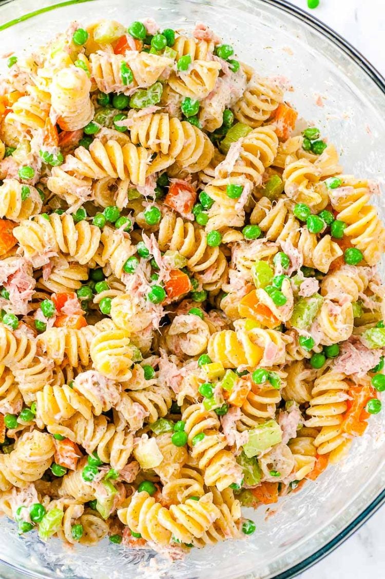 Overhead photo of tune noodle salad in a class bowl.