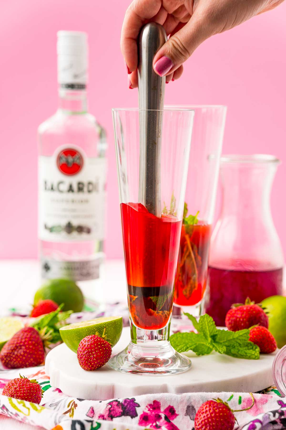 Cocktail being muddled.