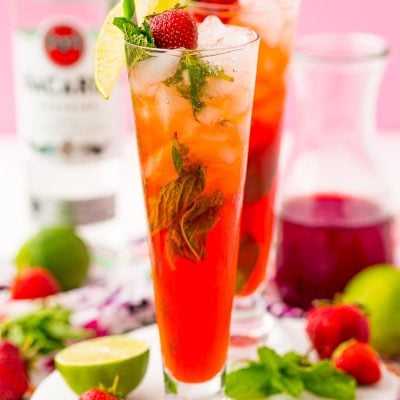 Strawberry mojitos in tall glasses.