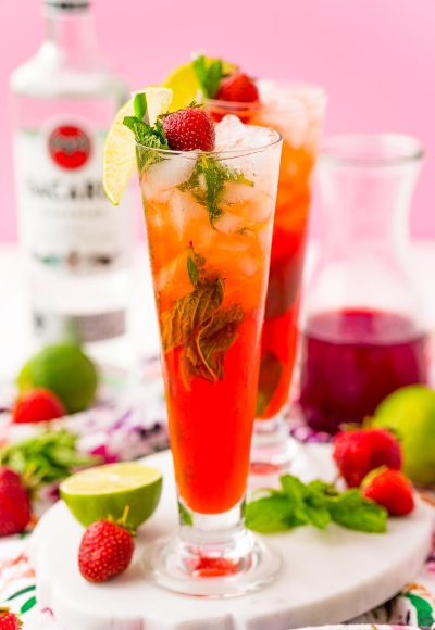 Strawberry mojitos in tall glasses.