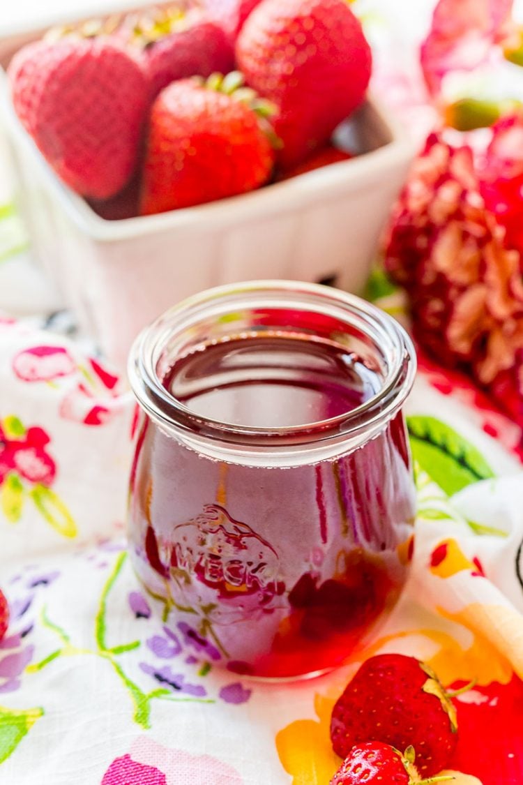 strawberry simple syrup in a small weck jar.