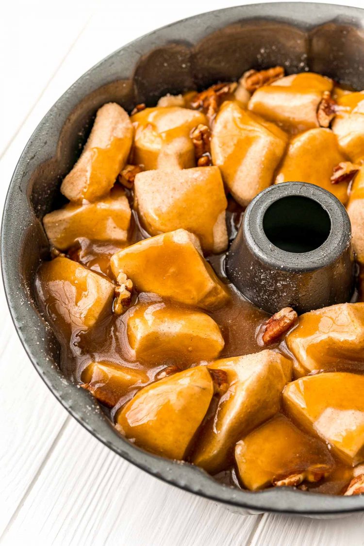 Monkey bread ready to go in the oven in a bundt pan.