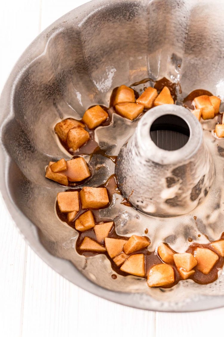 Apple mixture added to the bottom of a bundt pan to make apple monkey bread.