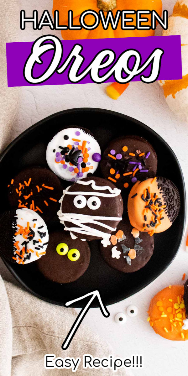 Halloween Chocolate Covered Oreos combine candy with everyone’s favorite cookie! Oreos are dipped in melted chocolate and covered in Halloween sprinkles, candy eyeballs, and chocolate swirls.  via @sugarandsoulco