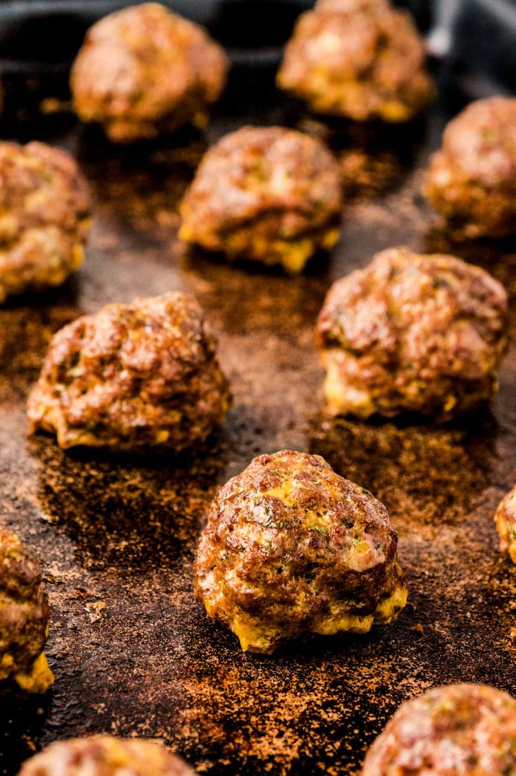 Baked meatballs of a baking sheet.