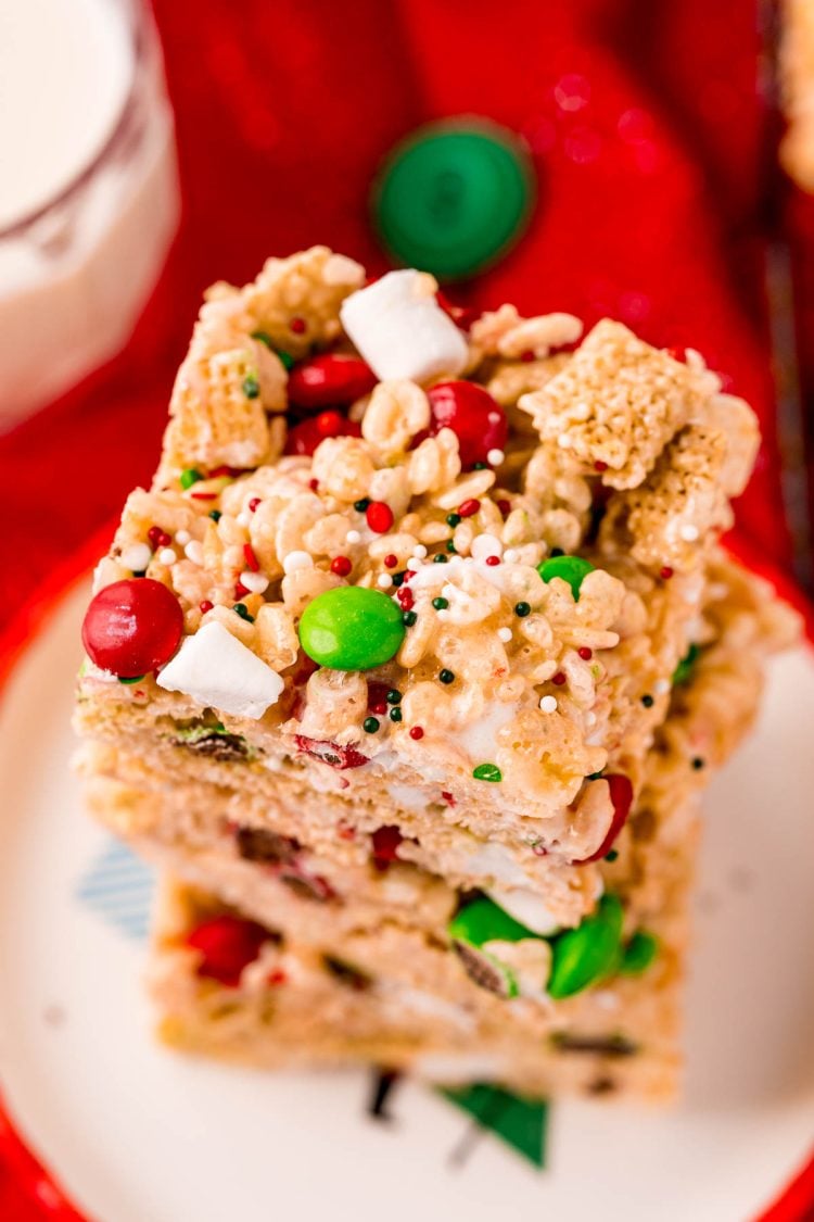 Close up photo of a stack of rice krispie treats with m&ms.