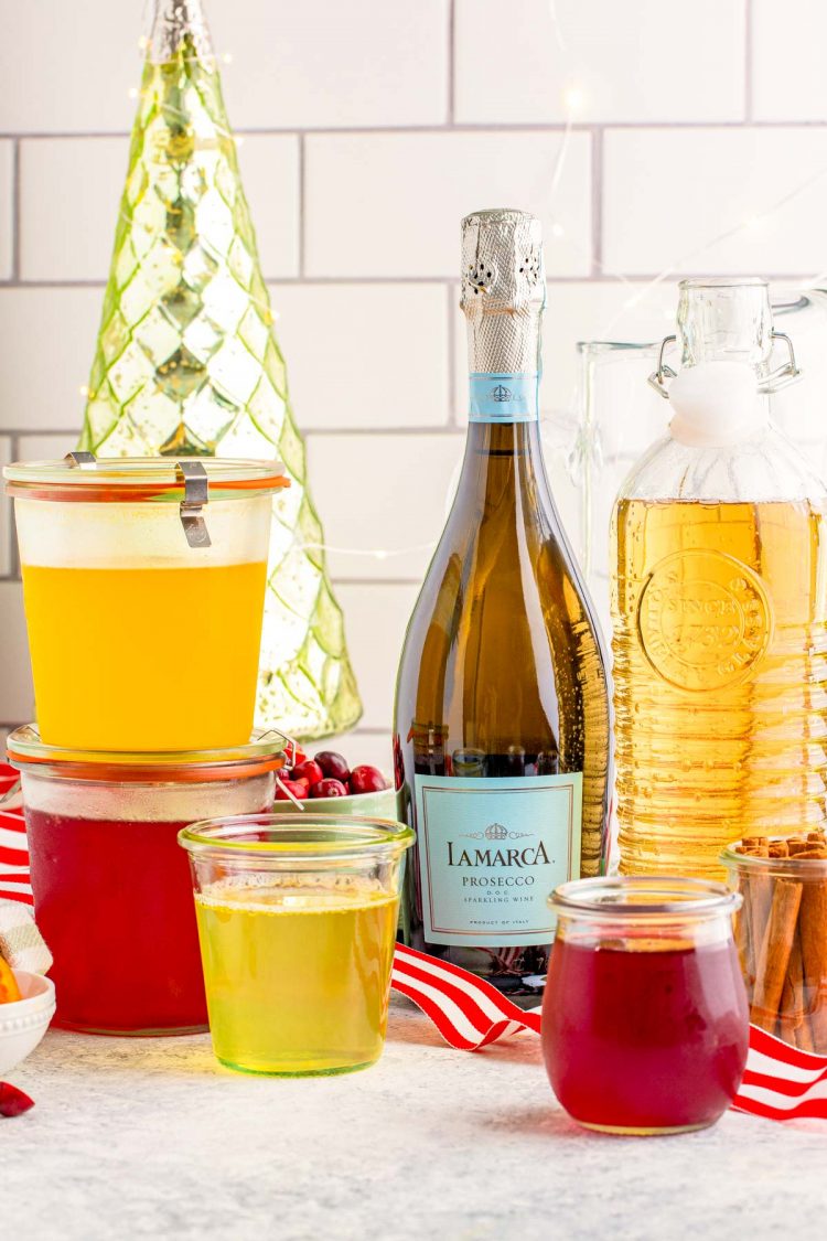 Ingredients to make Christmas punch on a marble surface.