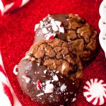 Close up photo of Peppermint brownie cookies on a red glittery surface.