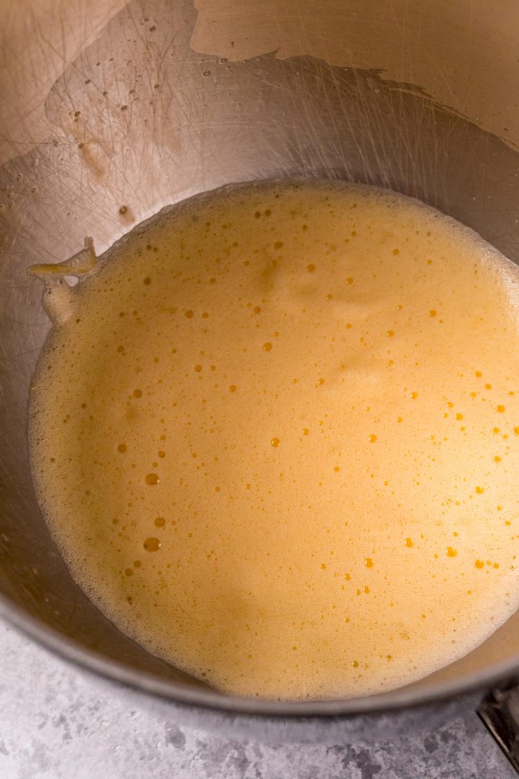 Foamy eggs in a mixing bowl.