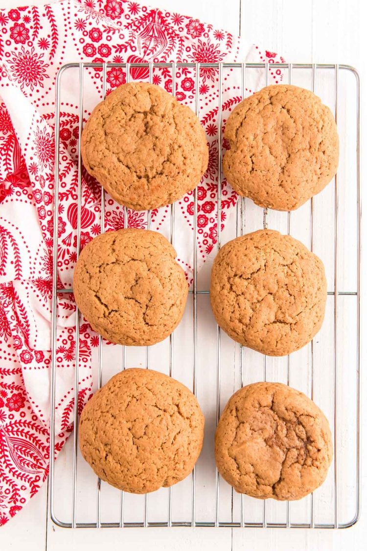 Whoopie pie cakes on a wire rack cooling.