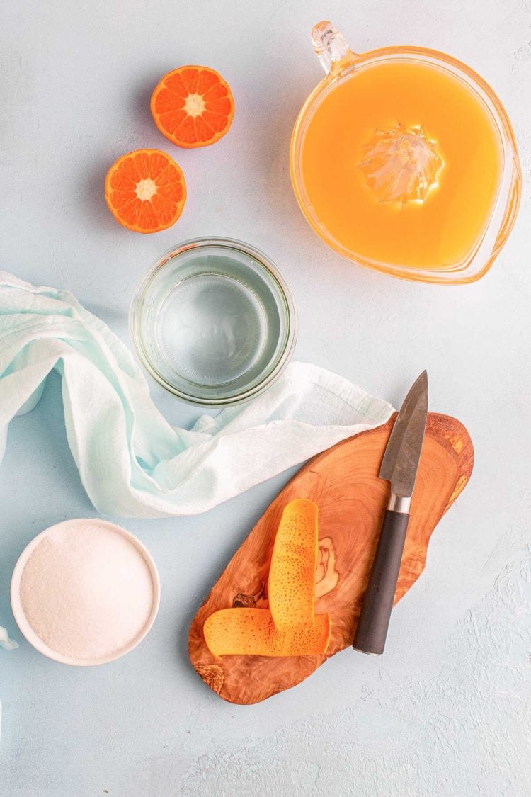 Overhead photo of ingredients to make orange simple syrup.