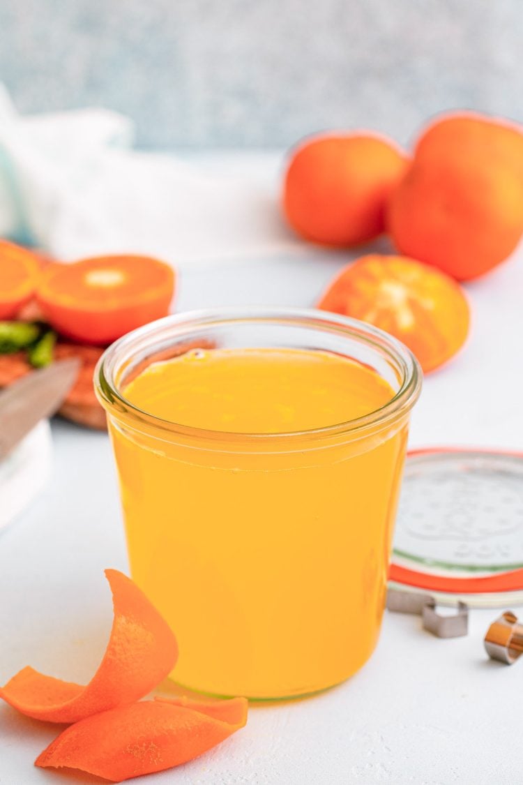 Close up photo of orange simple syrup.