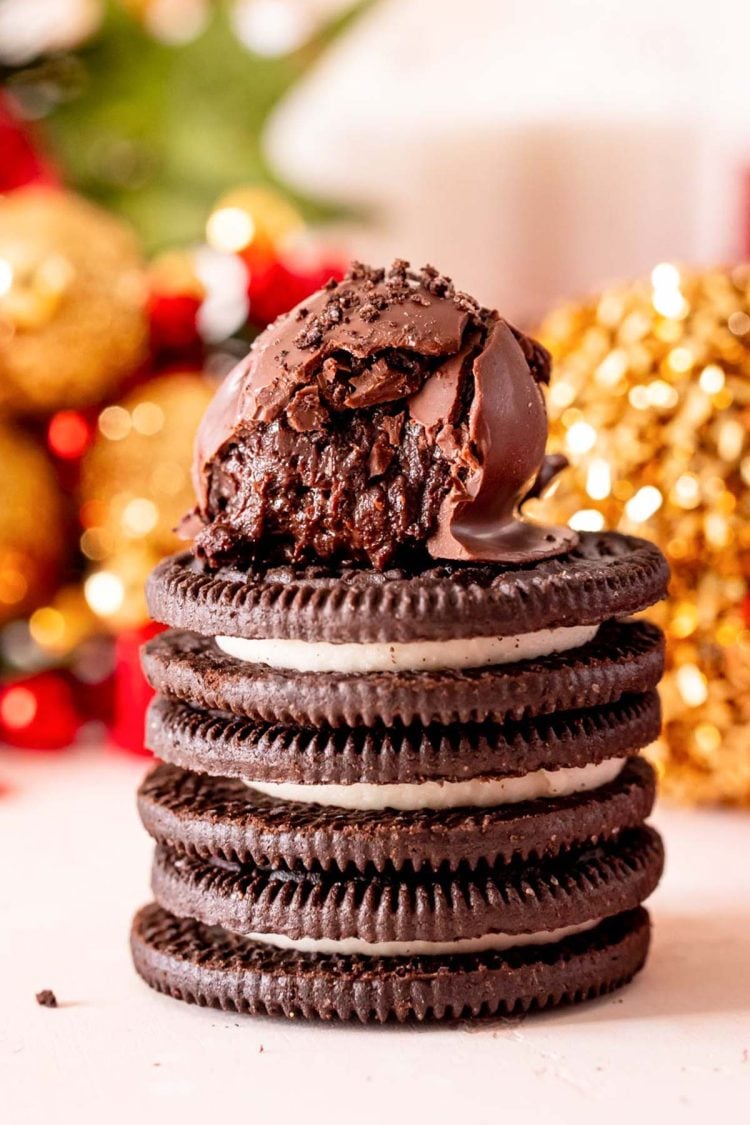 Oreo Truffle stacked on top of three oreo cookies