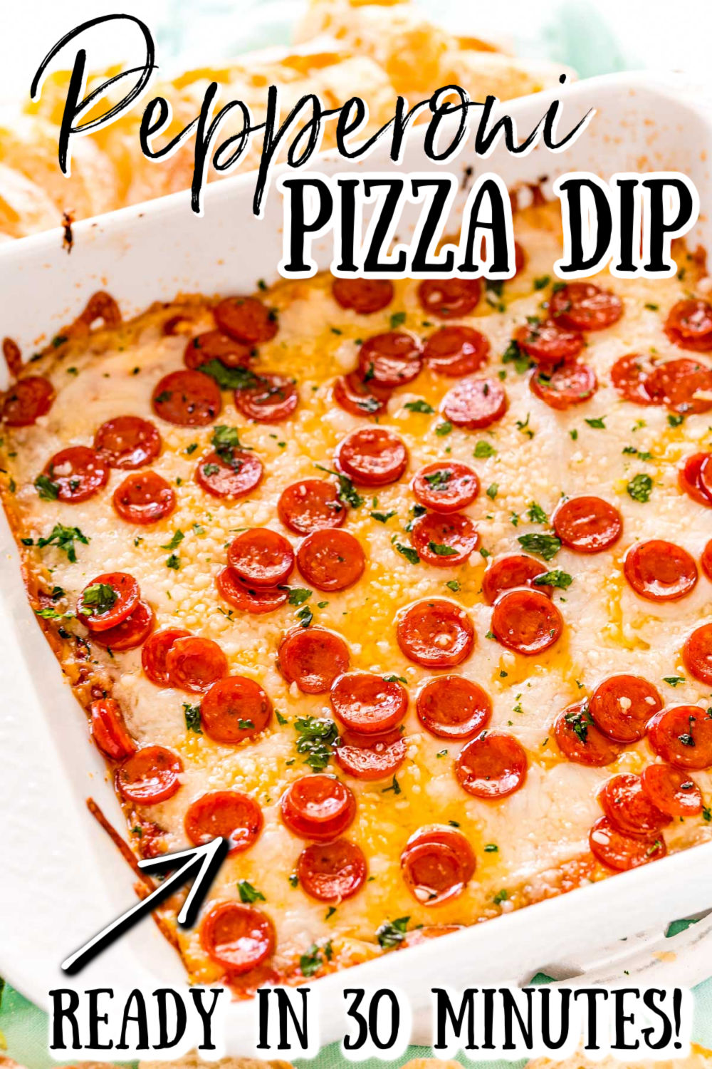 Pizza Dip is a warm cheesy appetizer perfect for game day parties, potlucks, or holidays! Pair this dip with your favorite tortilla chips, crackers, bread, or even vegetables and watch it quickly disappear as it becomes the crowd favorite!  via @sugarandsoulco