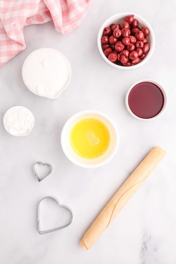 Overhead photos of ingredients to make hand pies on a counter.