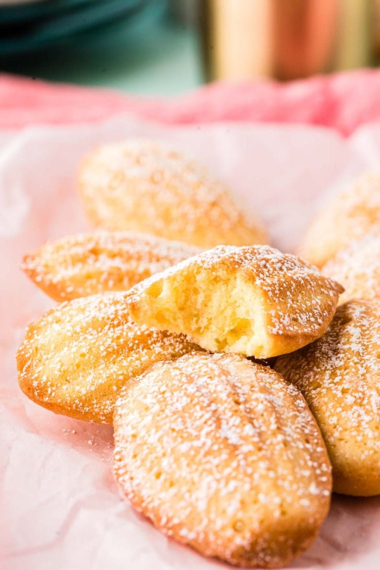 Close up photo of French Madeleines on a pink napkin.