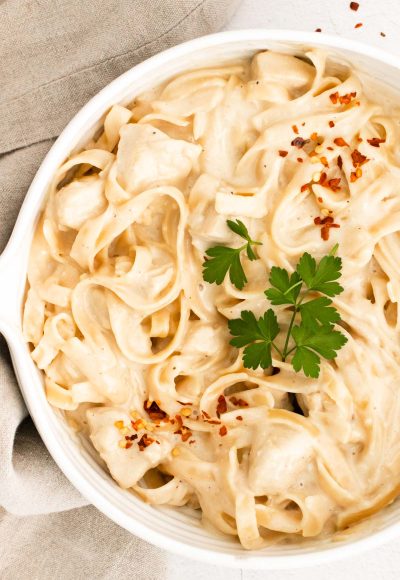 Overhead photo of a bowl on instant pot chicken alfredo.