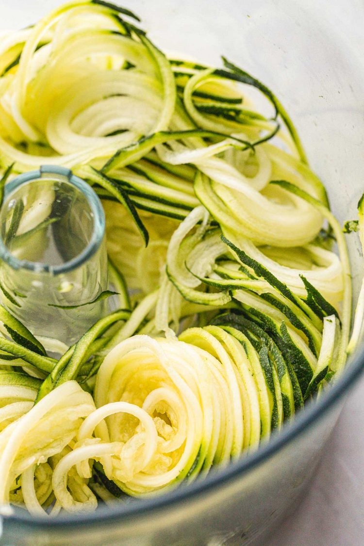 Zucchini noodles in spiralizer.