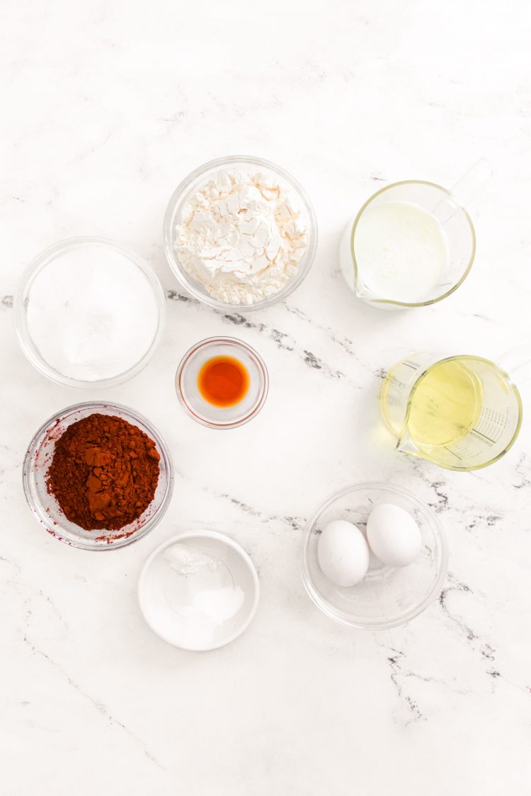 Ingredients to make chocolate cupcakes in prep bowls.