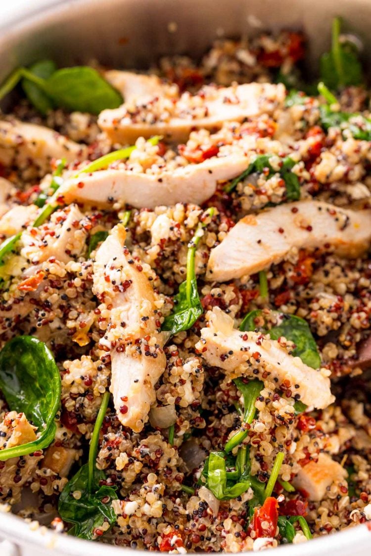 Close up photo of Greek Chicken quinoa in a pan.