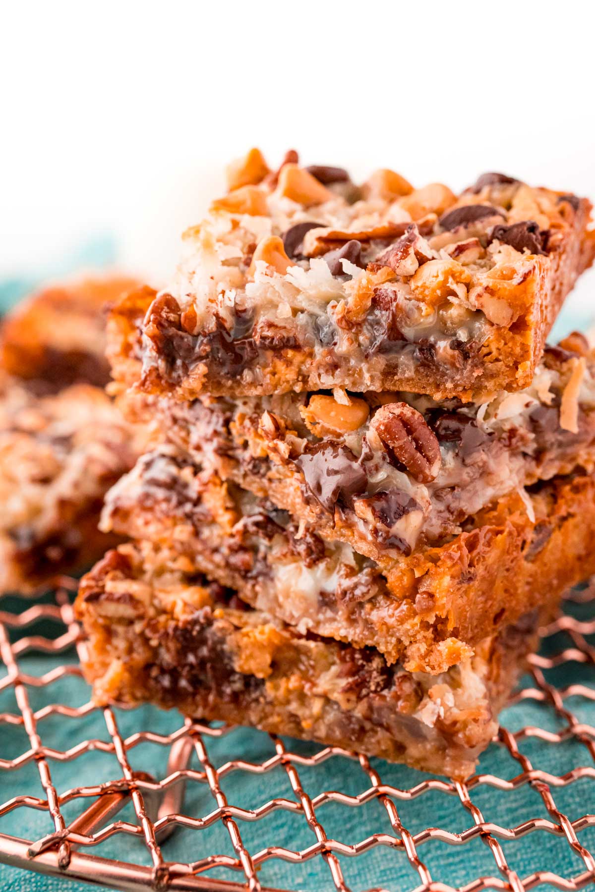 Close up photo of four hello dolly bars stacked on top of each other.