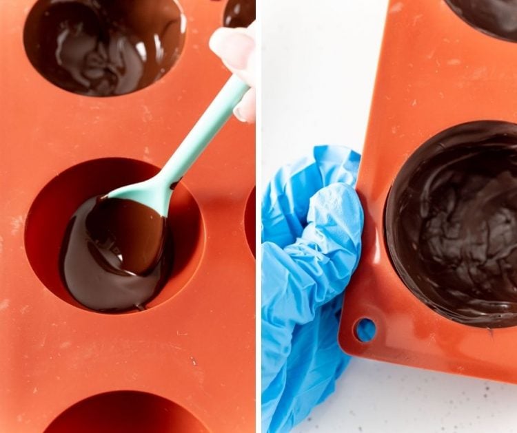 hot chocolate bombs being made in a silicone mold.